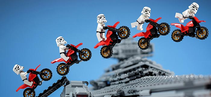 Image of lego Star Wars stormtroopers doing wheelies over starship for Quotacy blog Most Common Preventable Causes of Death.