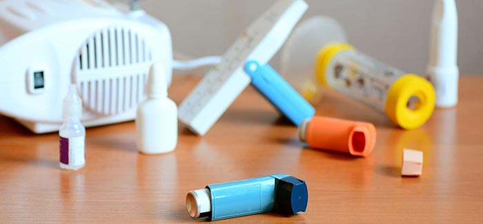 Image of inhaler and other medical devices for Quotacy blog Life Insurance and Asthma: Buyer's Guide.