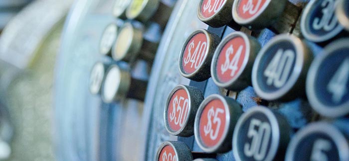 Image of old cash register buttons for Quotacy blog What Does It Mean to Save Age?