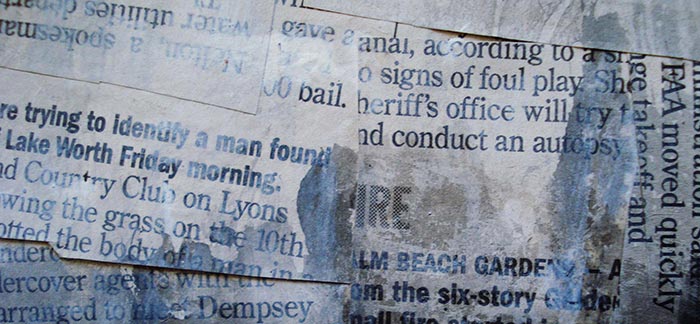 Image of newspaper snippets used as paper mache for Quotacy newsletter Remember Your Finance Fundamentals.
