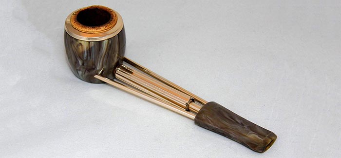 Image of a vintage smoking pipe for Quotacy blog Does Pipe Smoking Affect Life Insurance Rates?