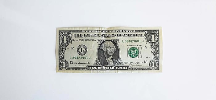 Image of one dollar bill for Quotacy blog: How Much Will I Pay for Life Insurance.