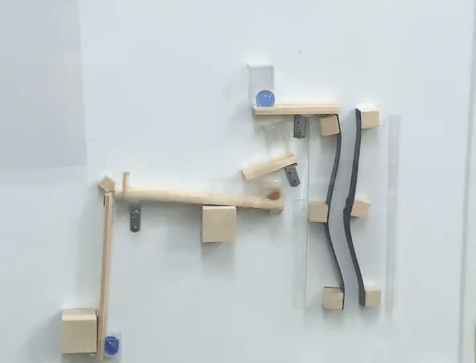 This is one small piece of a minutes-long rube goldberg device.