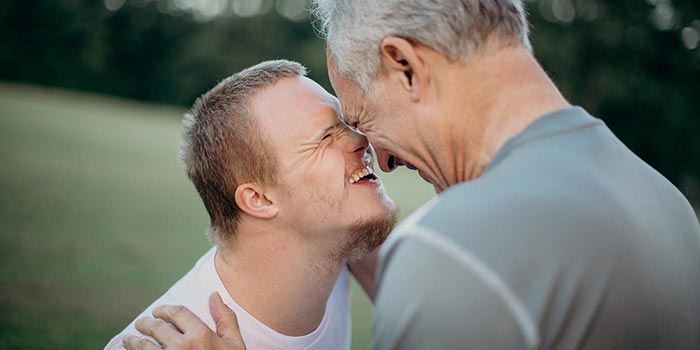 Image of father with special needs son.