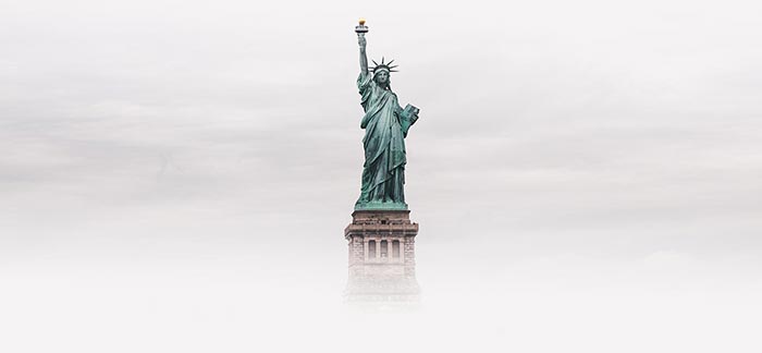 Statue of Liberty in the fog for Quotacy blog Term Life Insurance for New American Citizens: A Guide for Families