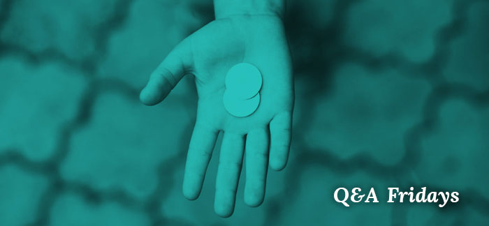 Image of a hand holding money for the Quotacy blog: Will My Life Insurance Payout if I Die Right After I Buy it? | Q&A Fridays.