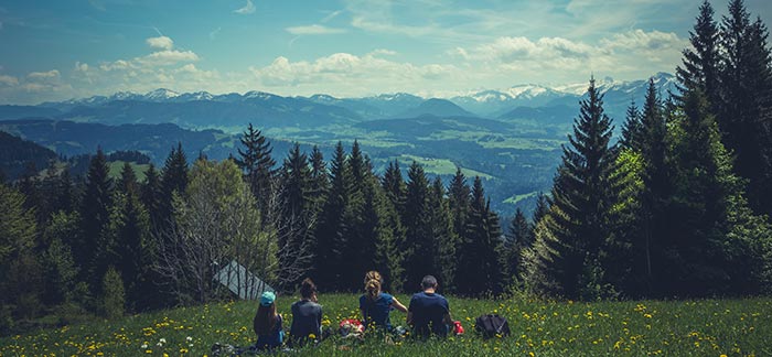 Image of a family overlooking a mountain scene for the Quotacy blog: Life Insurance Doesn’t Just Help Your Loved Ones.