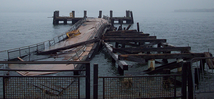 broken dock on lake for Quotacy blog about national disaster preparedness