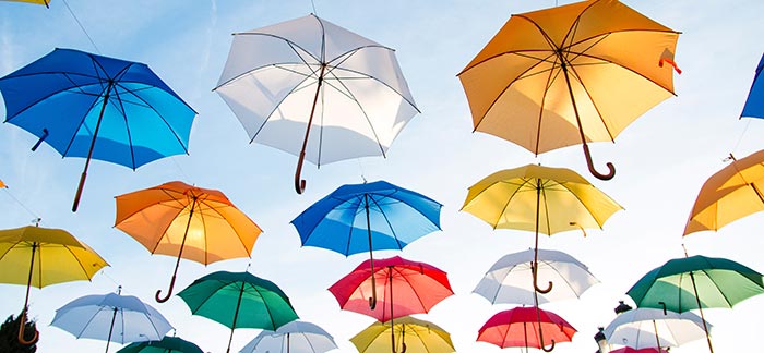colorful umbrellas for Quotacy blog Types of Insurance You Shouldn’t Go Without