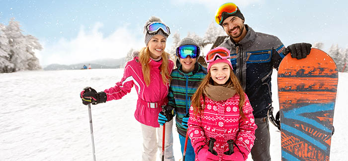 Family skiing for Quotacy blog about accidental death life insurance