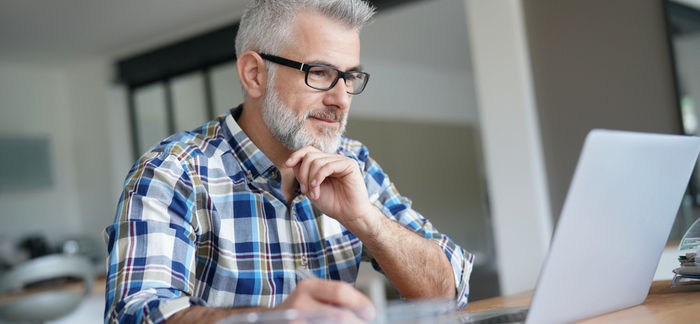 Older man on computer