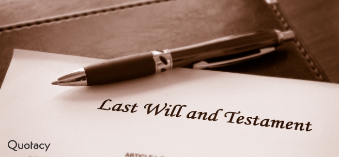 last will and testament with a pen next to it sitting on a brown surface